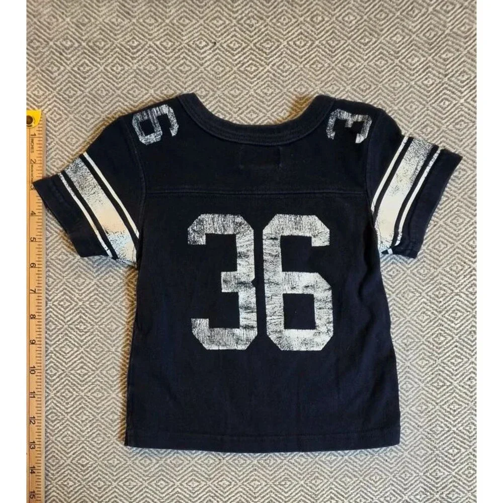 The Children’s Place baby boys’ football-style tee, size 6–9 months